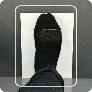 Top-down view of the foot lined up inside the on-screen capture frame